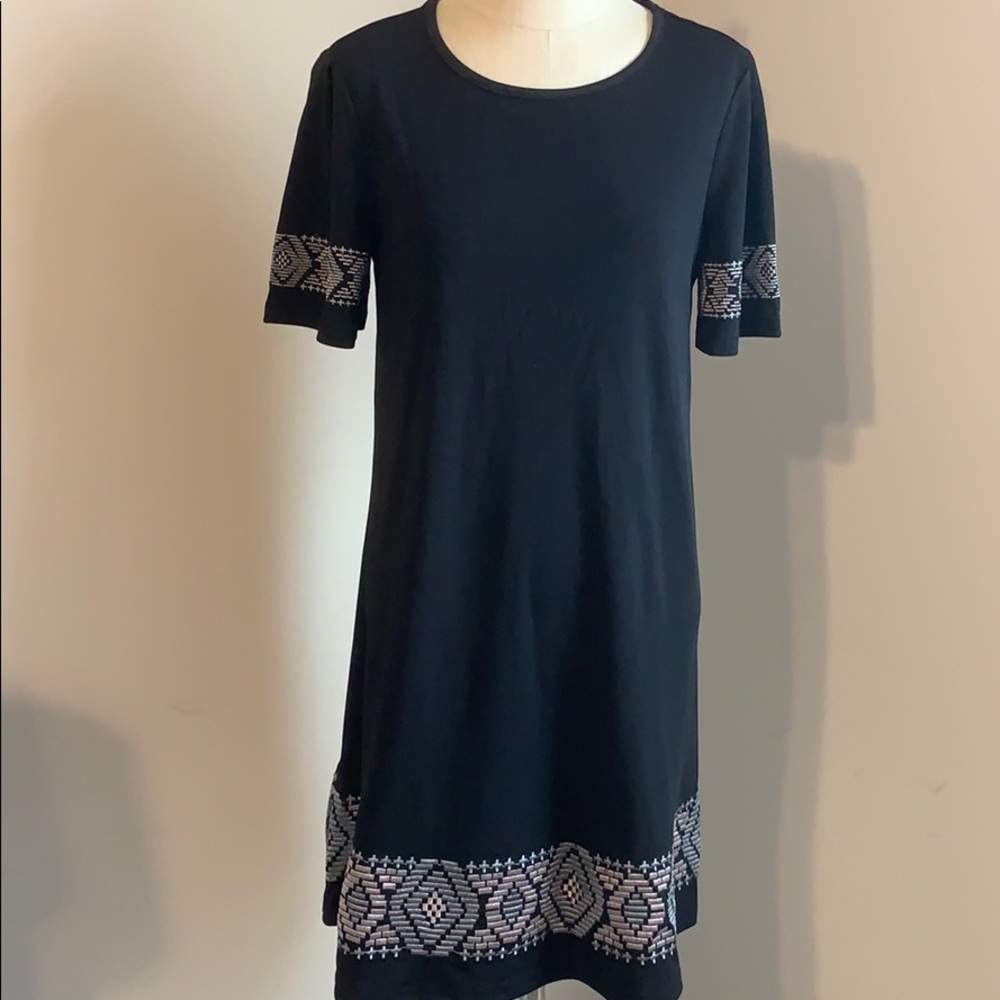 Elegant Black Dress with Geometric Accents